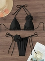 Flat lay of black bikini with 3D floral accents on wooden background with beach props - S / Black
