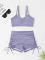Detail of lavender two-piece bikini with ruched V-neck top and side-tie boyshorts - S / Deep purple