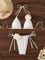 Detail of white triangle bikini top featuring a large 3D floral accent and tie strings - S / White