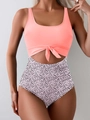 Detail of pink knotted top with teardrop cutout and high-waist polka dot bottom swimsuit - S / Pink