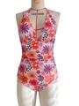 Sultry white one-piece halter swimsuit with vibrant pink and orange floral patterns - S / Floral