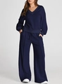 Detail of navy blue V-neck sweatshirt and matching high-waisted wide-leg lounge pants - Navy Blue