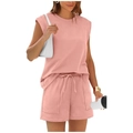 Detail of summer two-piece knit set featuring drawstring shorts and soft pink fabric - Pink