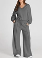 Detailed view of high-waisted drawstring trousers with central seam for a relaxed fit - Dark Gray