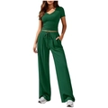 Detail of ribbed knit texture on dark green V-neck top and wide-leg drawstring pants - Green
