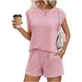 Close-up of pink knitted two-piece set showing ribbed texture and side pockets on shorts - S / Top And Bottom / Purple Pink