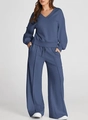Detail view of the Morandi blue knitted lounge set with V-neck top and wide-leg pants - Blue