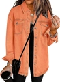 Detail of orange denim jacket featuring buttoned flap pockets and a frayed fringe hemline - Orange