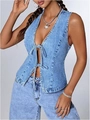 Detailed view of women's light blue washed denim vest with stylish front lace-up bows - S / Light Blue