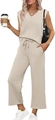 Detail van de mouwloze top met V-hals en wijde broek in beige getextureerde stof - S / Abrikoos