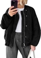 Close-up of wavy quilted texture and ribbed cuffs on black oversized bomber jacket - S / Black