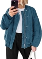 Detail of teal quilted bomber jacket featuring wave stitching and ribbed knit cuffs - Teal