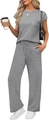 Détail de l'ensemble gris avec taille à cordon et texture de la poche fonctionnelle - S / Gris clair