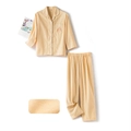 Beige katoenen kinderpyjamaset met hondenborduurwerk en wafelstructuur details - 110 / Abrikozengeel