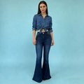 Detailed view of high-waisted flared denim jeans and knotted denim shirt set for women - XS / Dark Blue