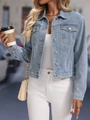 Detail of light blue washed denim jacket with metal buttons and classic chest pockets - XS / Light Blue