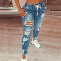 Damen Jeans in Blau mit hoher Taille, Rissen, elastischem Tunnelzugbund und Fransen am Saum - S / Hellblau