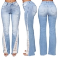 Jeans a zampa d'elefante azzurri da donna con strappi e finitura in denim lavato - S / Azzurro