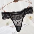Elegant black floral lace thong with ruffled waist displayed on a rose gold hanger - One Size / Black Full Lace Scalloped Edge Style(NK2029-Black)