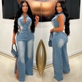 Nauwsluitende lichtblauwe denim jumpsuit met uitsnijdingen in de taille en knopen - S / Lichtblauw