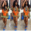 Klassieke Afrikaanse dashiki-jurk in levendig oranje met etnische traditionele prints - S / Oranje Bedrukt