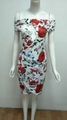 Detailed view of white off-shoulder mini dress with red floral print on a mannequin - S / White Floral Print
