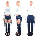 Detail of high waist ripped jeans with sequin pocket lining and distressed fringes - S / Top And Bottom / Blue Black