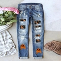 Detail of Halloween pumpkin print and distressed ripped patches on blue denim jeans - 3XL / Dancing Pumpkin Style
