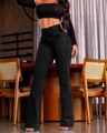 Detalle de vaqueros acampanados de tiro alto con cierre de tres botones y cintura elástica - S / Bottoms / Negro