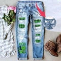 Jeans donna San Patrizio con toppe scozzesi verdi e stampa portafortuna - S / Azzurro