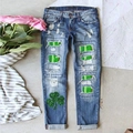 Dames jeans met gaten en groene klaver pailletten patches met omgeslagen zoom op steen - S / Donkerblauw