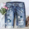 Deep blue distressed denim shorts with leopard print patches and bohemian style decor - S / Blue Orchid