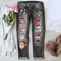 Jeans donna strappati con stampa Babbo Natale e toppe rosse in stile natura morta - S / Stampa Natalizia Nera