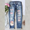 Distressed blue denim jeans with vintage Santa Claus patches and snowflake embroidery - S