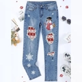 Lichtblauwe distressed damesjeans met kerstprint van sneeuwpoppen en sneeuwvlokken - 3XL / Gewassen Lichtblauw