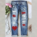 Jeans blu strappati con motivi a cuore, paillettes e stivali con frange sul fondo - S / Stampa Cuore Leopardato Blu