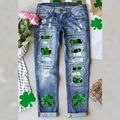 Damen Jeans mit mittlerer Taille, Kleeblatt-Druck und modischen Ripped-Details - S / Blau/Kleeblatt Druck