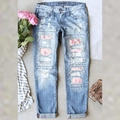 Light blue ripped jeans with floral patches, distressed mid-rise straight denim for women - 3XL / Light Blue (Hibiscus Print)
