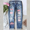 Blauwe distressed jeans met roze lovertjes en pompoenprint in moderne streetwear-stijl - S / Blauw (Roze Pompoen Print)