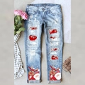 Light blue ripped jeans for women with Christmas Santa prints and red snowflake lining - S / Light Blue Reindeer Print