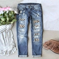 Women's casual blue ripped denim jeans featuring trendy leopard print patches and folded cuffs - S / Blue-Leopard Patch