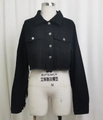 Detail of black denim jacket featuring frayed hem with fringe tassels and silver buttons - XS / Black