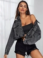 Detailansicht des ausgefransten Saums und der Risse an der kurzen Jeansjacke - XS / Schwarz