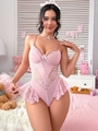Dettaglio del body in pizzo rosa con ricami floreali e fiocco decorativo morbido - S / Rosa