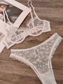 Completo intimo in pizzo bianco con motivi a cuore e bordi con volant - S / Top E Pantaloni / Bianco