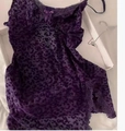 Deep purple leopard print babydoll dress with lace trim and bow accent in a flat lay view - S / New Purple