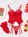 Flat lay of red lace lingerie set with garters, stockings and floral rose accents - Red