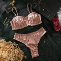 Detail of ruched satin lingerie set in lotus pink with elegant ruffled trim and smooth texture - S / Apricot Pink