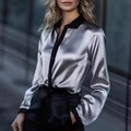 Elegante zilveren satijnen blouse met lange mouwen en zwarte contrasterende details - S / Grijs