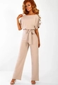 Detail of elegant beige off-shoulder jumpsuit with waist tie and wide leg silhouette - Apricot